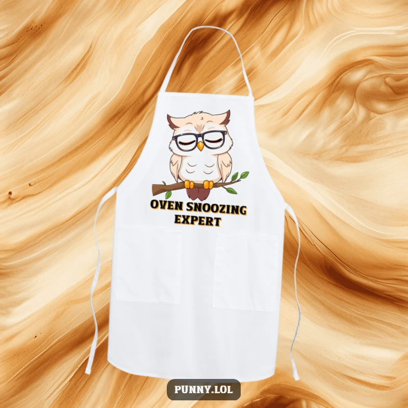 Funny apron with a sleepy owl wearing reading glasses, nodding off on a branch, designed for cooks who appreciate wisdom and a good nap.