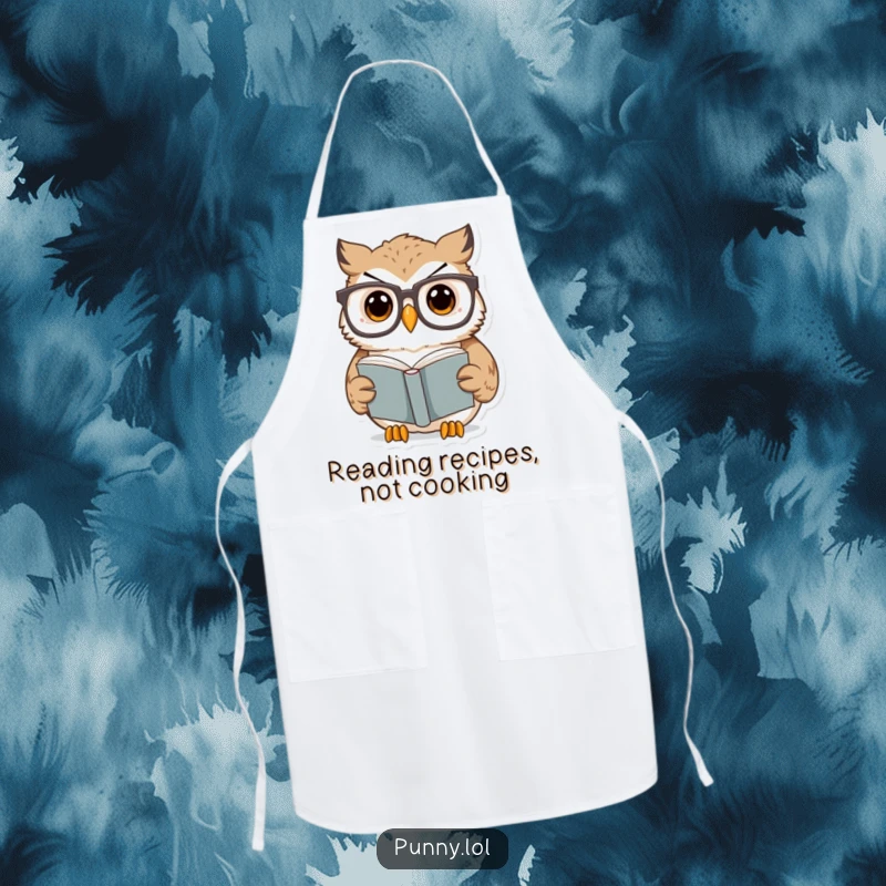 Funny Owl Apron showing a surprised owl wearing oversized glasses reading a tiny book, ideal for kitchen fun and a funny gift.
