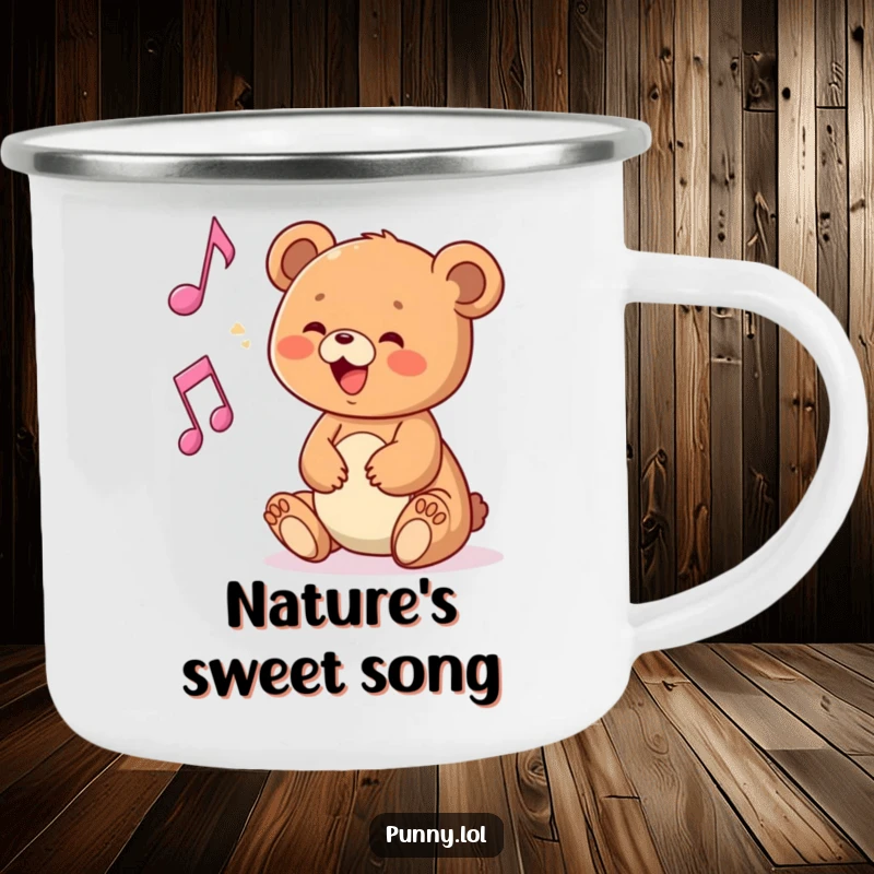 Funny camping mug with a bear cub playing with a musical note, for outdoor music enjoyment.