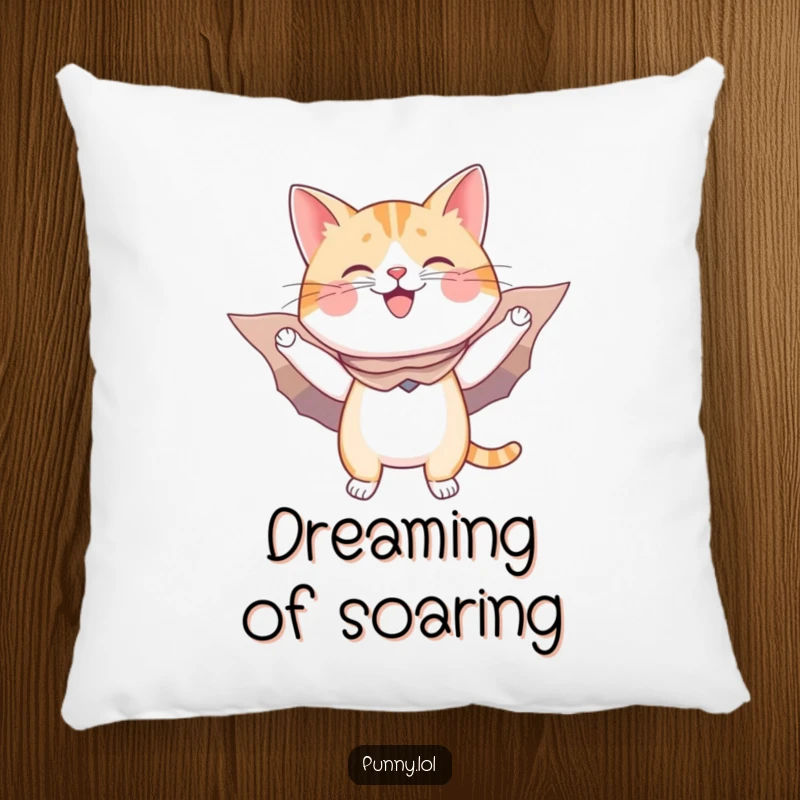 Funny pillow design: a happy cat in a cape and cardboard wings pretends to fly, offering humorous comfort.