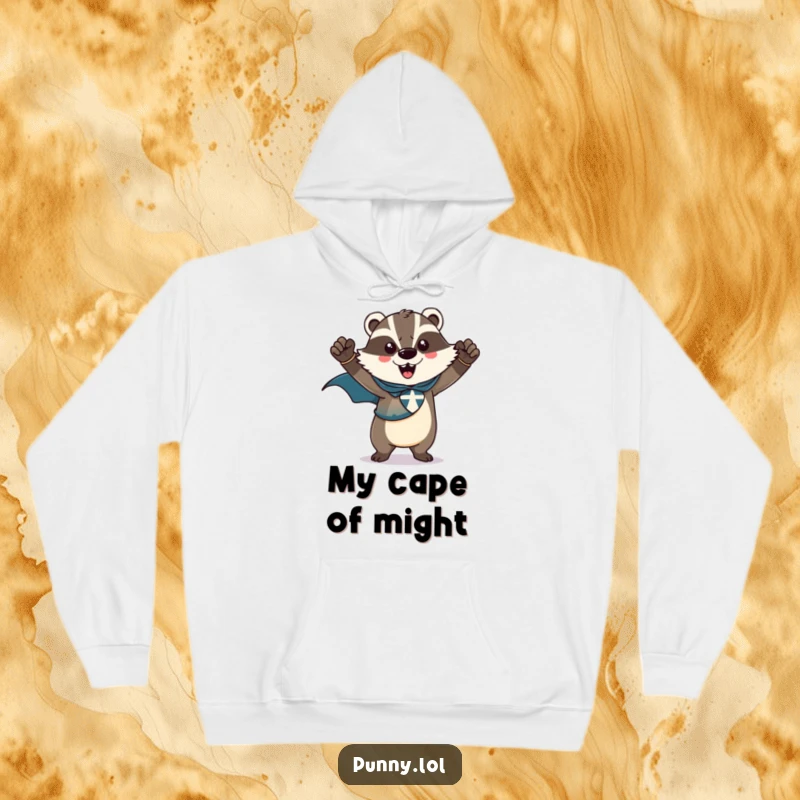 Funny, comfortable hoodie featuring a triumphant badger wearing a superhero cape, striking a heroic pose, offering a powerful and cozy vibe.