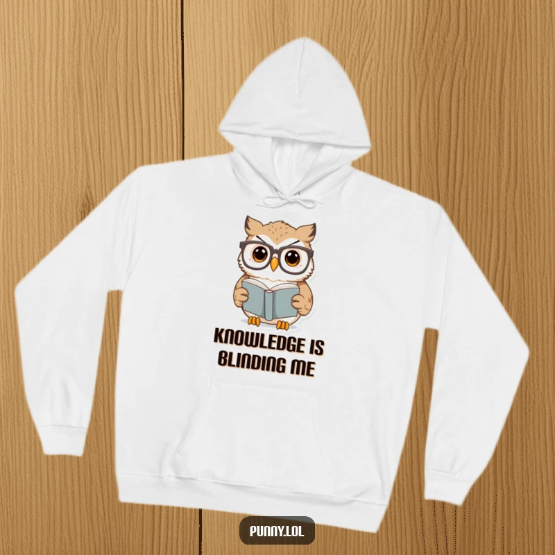 Funny Owl Hoodie showing a surprised owl in oversized glasses reading a tiny book, perfect for cozy reading and a funny gift.