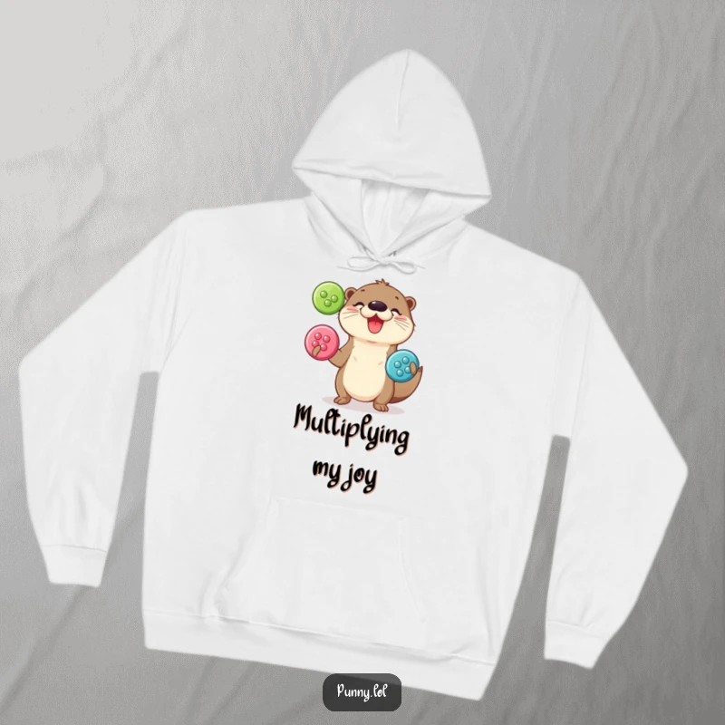 Funny Hoodie: A cozy sweatshirt depicting a playful otter joyfully juggling shiny buttons.