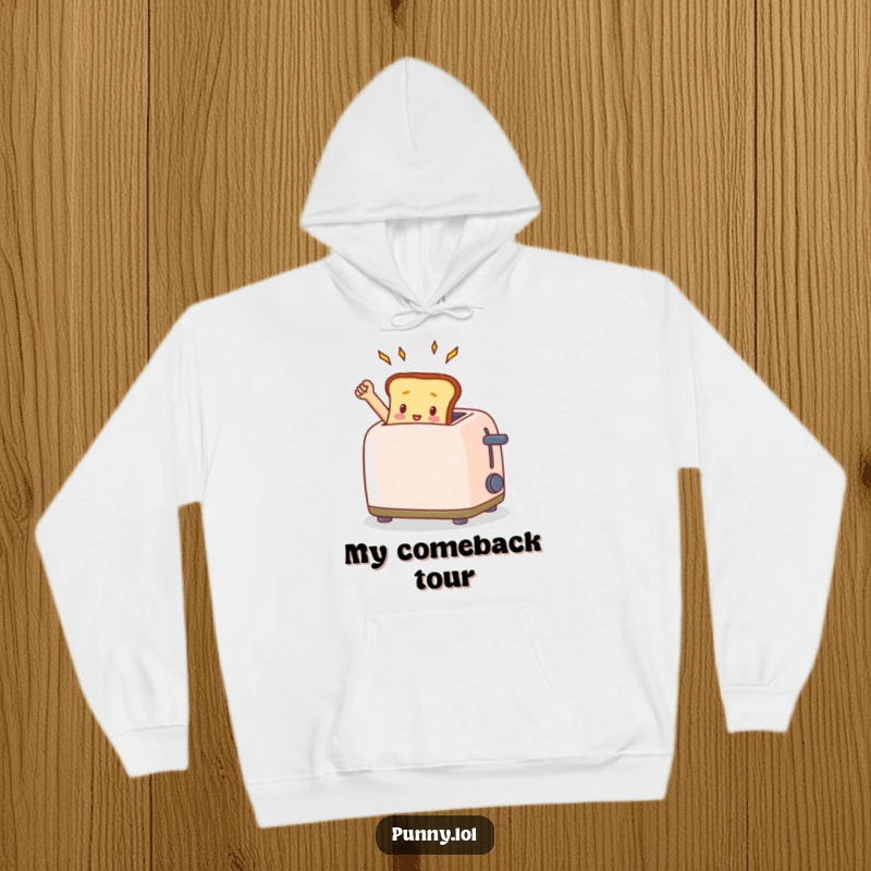 Comfortable hoodie featuring a funny toast popping triumphantly from a toaster, offering warmth and breakfast humor.