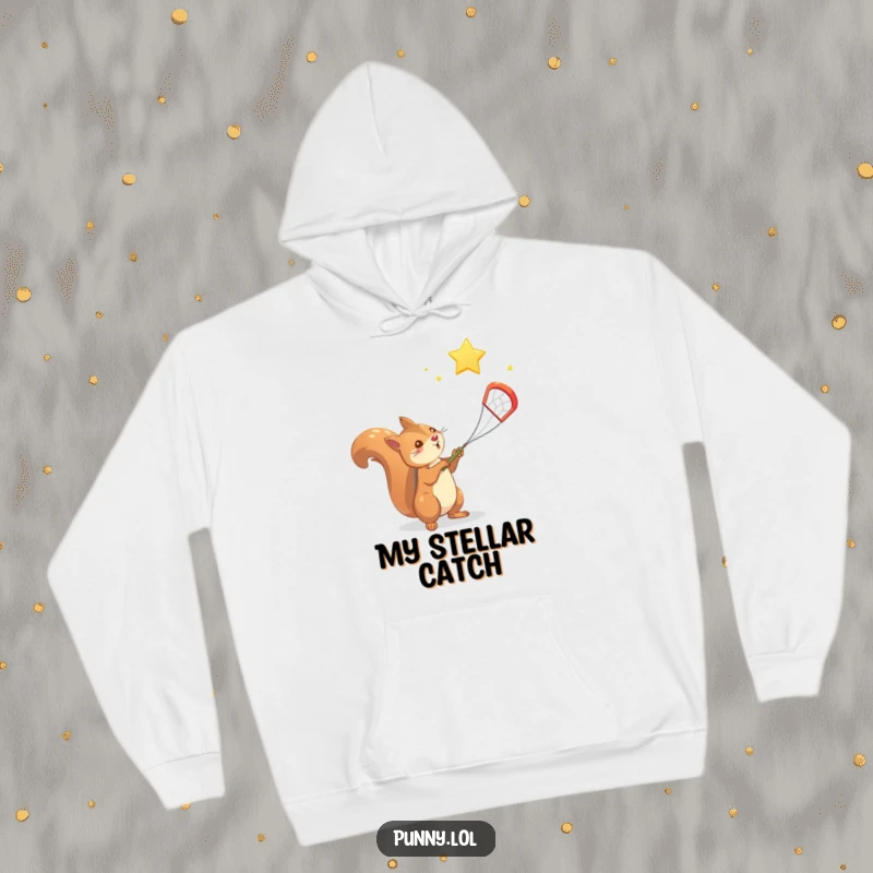 Funny Squirrel Hoodie: A determined squirrel uses a net to capture a twinkling falling star against a night sky.