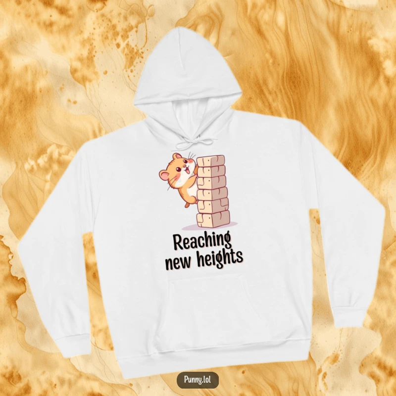 Funny hamster hoodie showing a small, focused rodent diligently attempting to ascend a large block, symbolizing ambition.