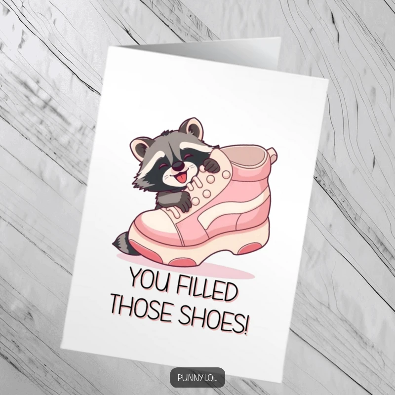 Funny Free Printable Congratulations Card showing a playful raccoon embracing a giant inflatable shoe, celebrating a big achievement.