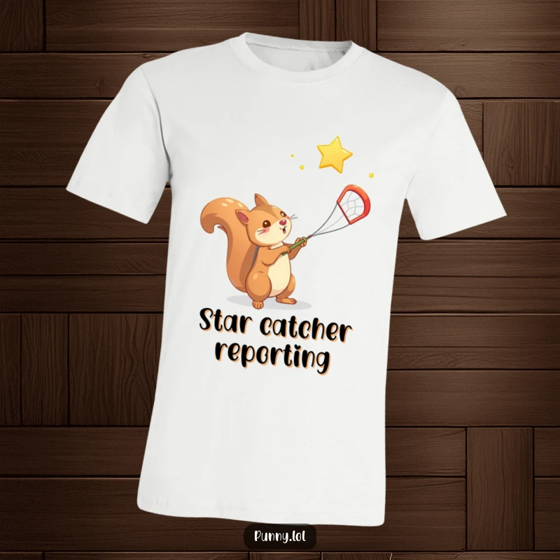 Funny Squirrel T-Shirt: A determined squirrel casts a net to catch a bright falling star in a whimsical scene.