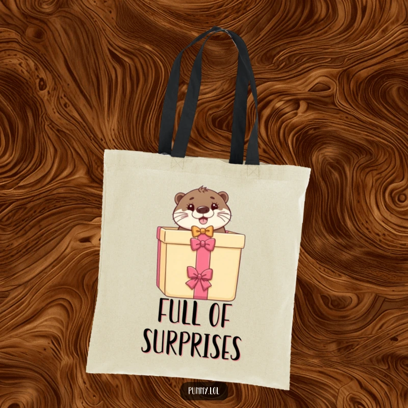 Funny tote bag depicting a happy otter with a bow tie peeking out of a gift box, great for shopping.